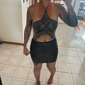 Brand new dress never used it’s a large fits like a med